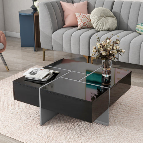 Modern living room with a gray sofa, black coffee table, and decorative items.