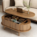 Wooden coffee table with storage compartments in a living room setting