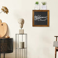 Decorative wall art with 'Happiness' on a blackboard in a home interior setting.